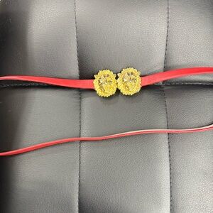 Vintage 1981 Jeanne Bouchever Red Belt with Gold Lion Accents